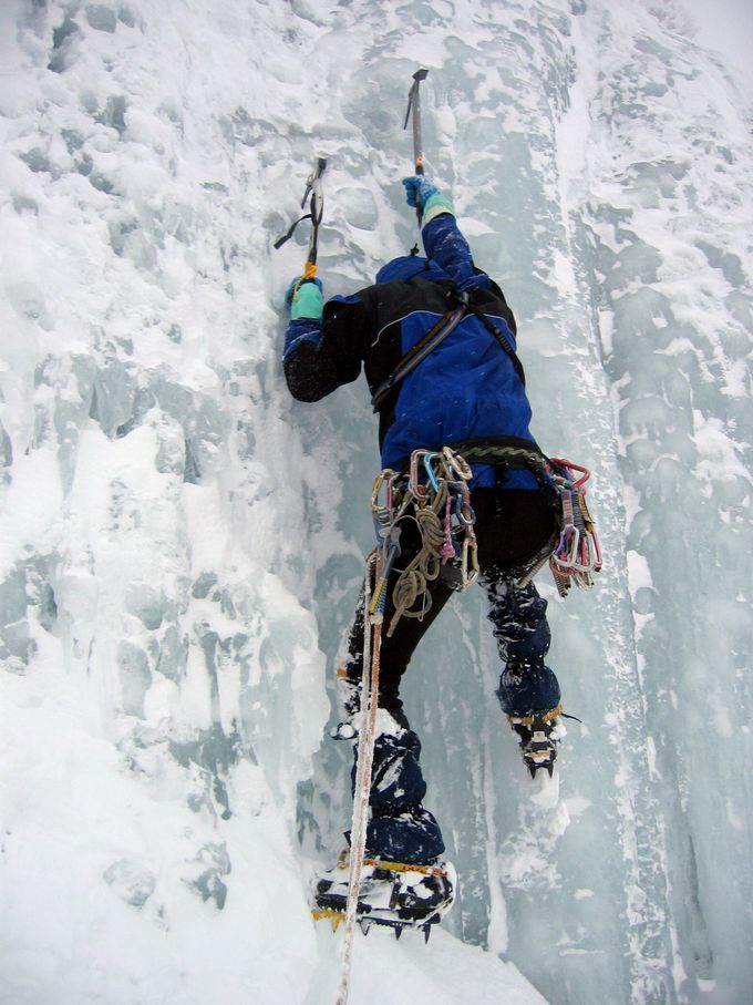 Man ice climbing